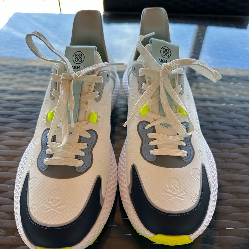GFORE White and Gray Golf Shoes with Neon Accents and skull with crossbones